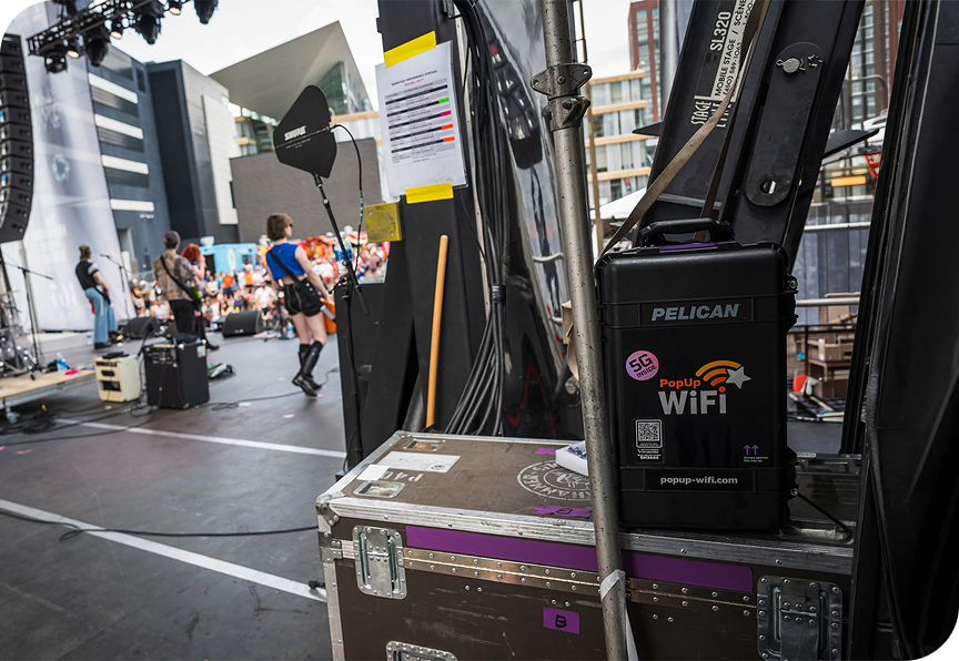 PopUp WiFi Titan unit behind the stage of a live streaming event